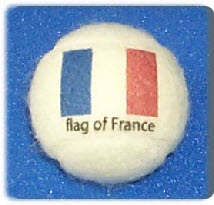 tennis balls branded  with French Flag