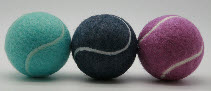 3 different pastel colured tennis balls