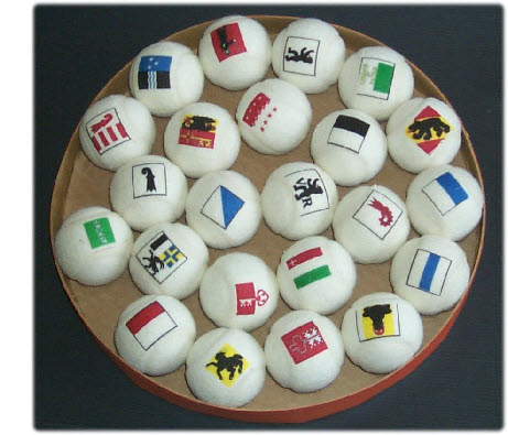 tennis balls branded with flags of the swiss cantons